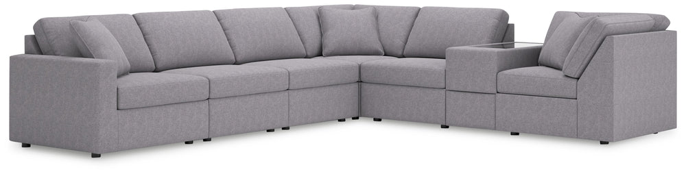Looking cool and contemporary is great. But when it comes down to it, youâ€™re all about low-maintenance lounging. With the performance fabric on this sectional with console, cleaning spills is a breeze. Its customizable modular design caters to your ever