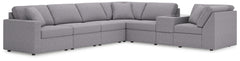 Looking cool and contemporary is great. But when it comes down to it, youâ€™re all about low-maintenance lounging. With the performance fabric on this sectional with console, cleaning spills is a breeze. Its customizable modular design caters to your ever