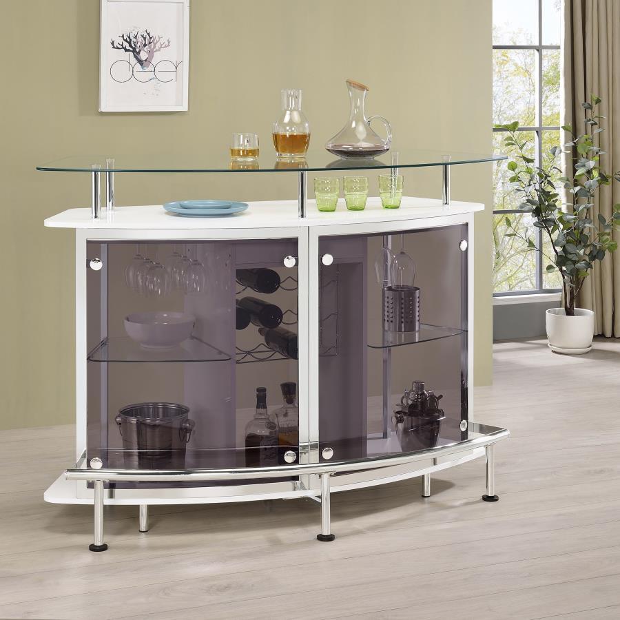 Chic with striking mixed material design, this contemporary bar unit elevates a modern style home. With a curved shape, this bar unit works perfectly in the corner of a media room or dining space, offering a place for guests to conjure together and serve 