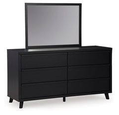 Sophisticated style for the savvy shopper. This dresser with mirror prioritizes affordable, on-trend design. Its subtle replicated texture recalls the natural beauty of wood, highlighting the slatted styling. And a matte black finish savvily suits differe