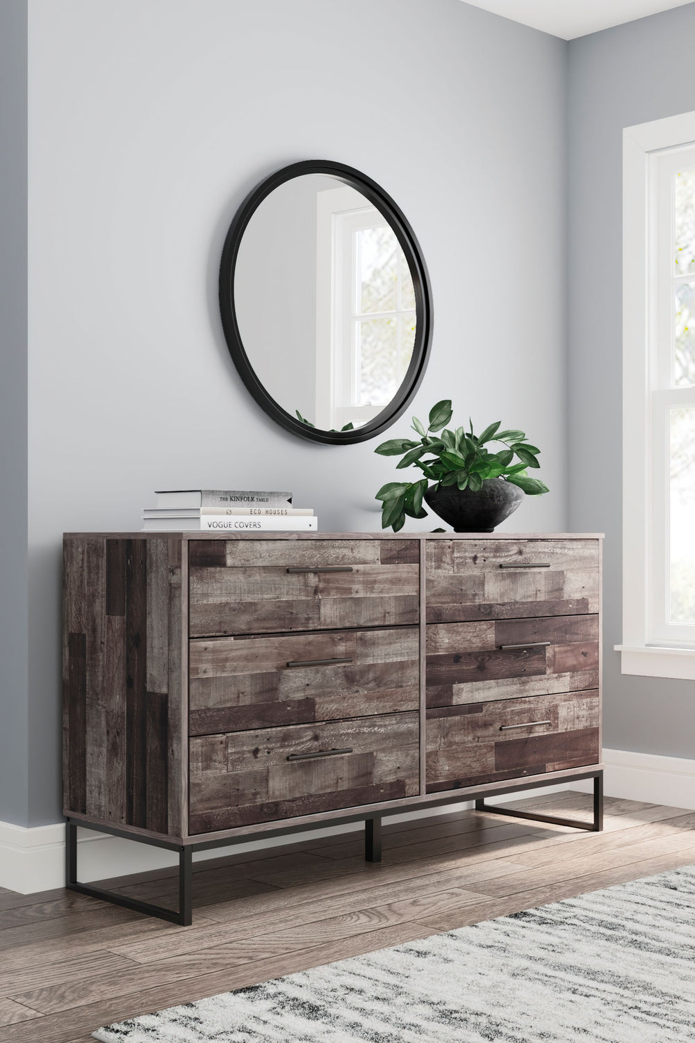 Streamlined design and a stunning finish come together in one simply extraordinary piece. This dresser is sure to impress with six smooth-operating drawers, canted metal legs and a rustic butcher block finish over replicated pine grain texture. Its mid-ce
