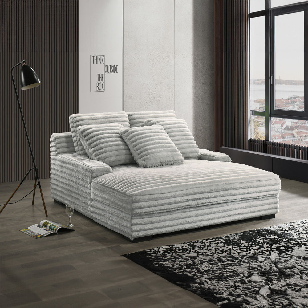 The Embrace Dual Chaise Lounge in gray is a luxurious and versatile addition to your home, perfect for both lounging and accommodating guests. Featuring 100% gray polyester fabric with a fluffy, blanket-like texture, this chaise lounge is designed for ult