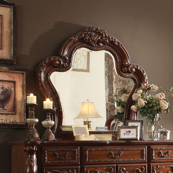 The Dresden beveled Mirror is crafted with the finest solid woods with veneers in cherry oak finish. Dresden Collection is enhanced by remarkable marquetry and generously carved wood elements.<br/><br/><b>Product Features</b><ul><li>Mirror: Beveled</li><l