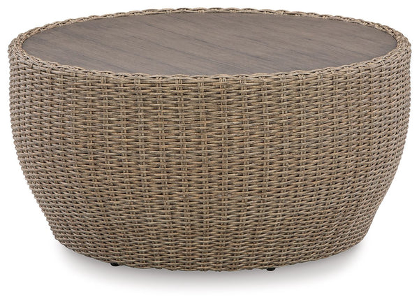 This coffee table completes your outdoor seating area with its fresh take on casual comfort. Handwoven resin wicker over a curving frame balances streamlined style and exceptional durability. An aluminum top polishes off the piece, acting as a perfect per