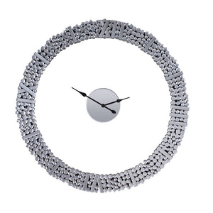 The march of time is predictable, but that doesn-'t mean the appearance of your clock has to be! This design is sure to work as a focal point in any ensemble with features like a striking round silhouette, and mirrored panels with faux gems. The Kachina w