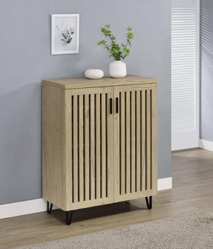 designed to keep your footwear organized and out of sight while complementing a variety of interior styles. Behind its distinctive vertical-slatted doors