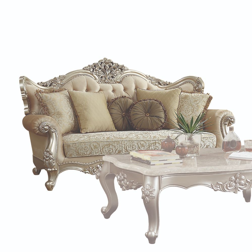 This beautiful elegant sofa set blends classic French and European inspired Victorian-era elements into one. The luxurious champagne finished, crystal like button tufted back and plush seat support you in lavish comfort and extraordinary style. The intric