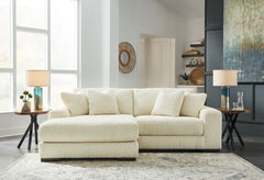 Plush and posh. Showcase your eye for on-trend texture with the statement-making cord upholstery of this sectional with chaise. Its stunningly soft fabric entices in an ivory hue, complementing contemporary color palettes. Sink into the cushions and plan 