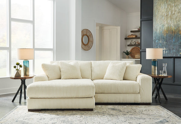 Plush and posh. Showcase your eye for on-trend texture with the statement-making cord upholstery of this sectional with chaise. Its stunningly soft fabric entices in an ivory hue, complementing contemporary color palettes. Sink into the cushions and plan 