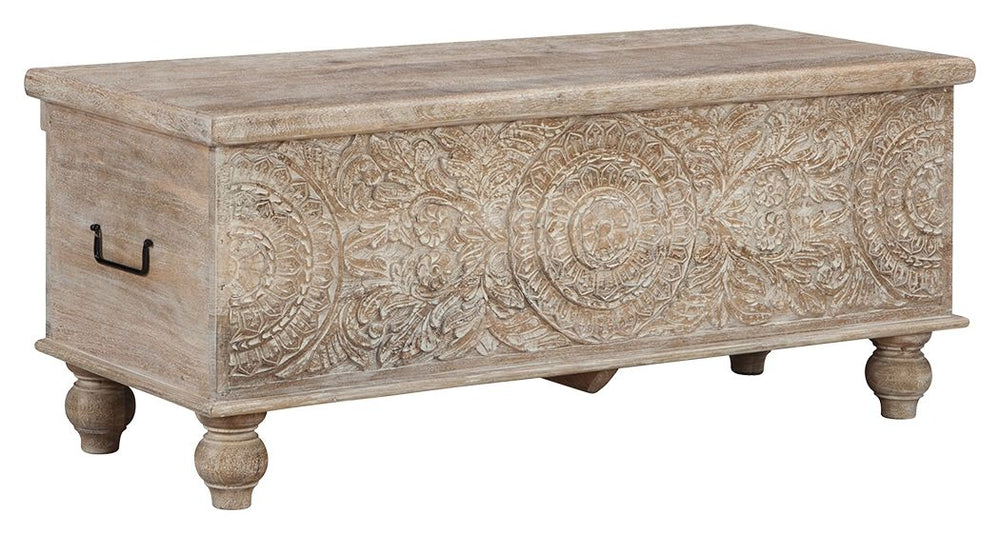 Merging practical storage with an exotic sense of flair, this storage bench stands out from the crowd in an intriguing way. Its grainy wood is beautified with an antique white finish, and the ornamental medallion carvings are pure artistry.<br><br><b>Addi