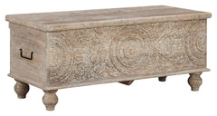 Merging practical storage with an exotic sense of flair, this storage bench stands out from the crowd in an intriguing way. Its grainy wood is beautified with an antique white finish, and the ornamental medallion carvings are pure artistry.<br><br><b>Addi