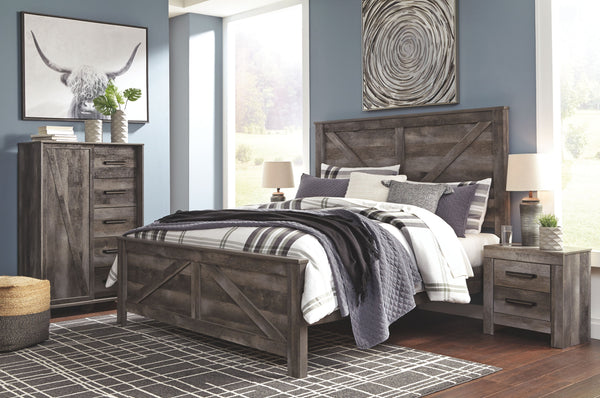 Rustic gray planked replicated oak grain with authentic touch. Large scaled dark colored hooded pull. Sticks across headboard give a thick planked look. Side roller glides for smooth operating drawers. Cases feature a framed front and pilasters. Large dra