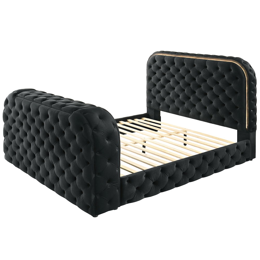 Cozy up in bed with the Kana black velvet bed. This bed features all the bells and whistles imaginable that make it impossible to ever leave. The built-in footboard fireplace (without heat) creates a relaxing ambiance. The footboard also houses a hidden T