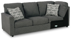 This left-arm facing sofa with corner wedge is made with polyester upholstery. Pairs with other items in the series to make a sectional.<br><br><b>Additional Dimensions</b><br><ul><li>Arm height: 25-"</li><li>Seat height: 19-"</li><li>Top of cushion to to