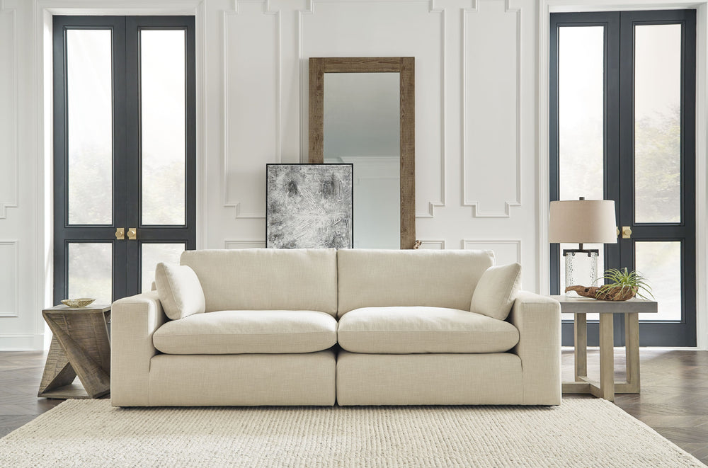 Down with uptown style. This sectional goes to town with a high-design aesthetic, sleek sophistication and sumptuous comfort that are temptingly affordable. Wide track arms, softened by plush side pillows, offer a welcoming look and feel, while back pillo