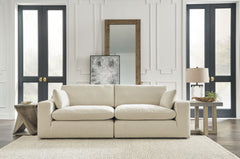 Down with uptown style. This sectional goes to town with a high-design aesthetic, sleek sophistication and sumptuous comfort that are temptingly affordable. Wide track arms, softened by plush side pillows, offer a welcoming look and feel, while back pillo