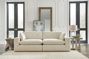 Down with uptown style. This sectional goes to town with a high-design aesthetic, sleek sophistication and sumptuous comfort that are temptingly affordable. Wide track arms, softened by plush side pillows, offer a welcoming look and feel, while back pillo