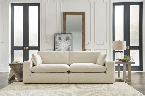 Down with uptown style. This sectional goes to town with a high-design aesthetic, sleek sophistication and sumptuous comfort that are temptingly affordable. Wide track arms, softened by plush side pillows, offer a welcoming look and feel, while back pillo