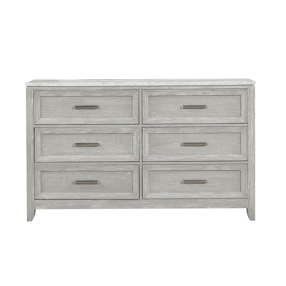 Crafted with precision, the Fiona 6 Drawer Dresser seamlessly combines the beauty of real wood with durability. Its construction features Acacia Solids, Manufactured Woods, and Oak Veneer, ensuring strength and stability. The multi-step finish, achieved t