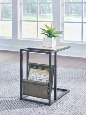  its tabletop is finished in a light natural wood tone that lends a fresh
