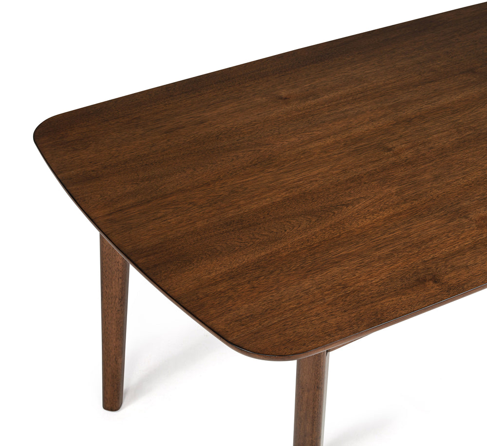 Transform your dining space with this elegantly designed dining set, where timeless craftsmanship meets modern comfort. Featuring a beautifully finished wooden table with rounded edges, this ensemble creates a warm and inviting atmosphere for family meals