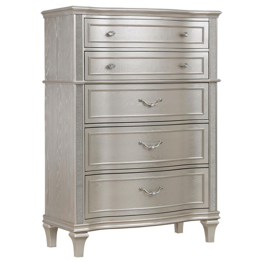 Elevate your guest room or main bedroom with this breathtaking glam chest. The space-saving tall design boasts a curvy front facade, seen throughout the wavy wood trim appointed drawer panels. Five spacious drawers offer ample space for all your bedroom n