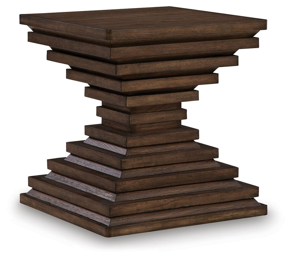 A statement-making table? Yes, please. The distinctive silhouette of this end table is sure to captivate lovers of contemporary design. Featuring head-turning architectural geometry and a rich, inviting warm brown finish, this piece is ready to take your 
