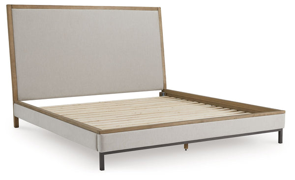  while its functional features add convenience. A cushioned lay-back headboard makes reading or