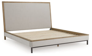 while its functional features add convenience. A cushioned lay-back headboard makes reading or