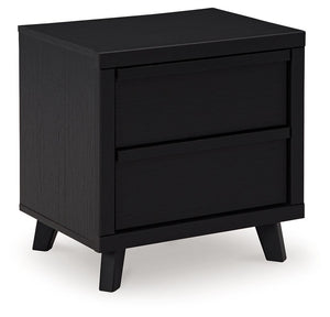Sophisticated style for the savvy shopper. This nightstand prioritizes affordable, on-trend design. Its subtle replicated texture recalls the natural beauty of wood, highlighting the clean-lined form. And a matte black finish savvily suits different appro
