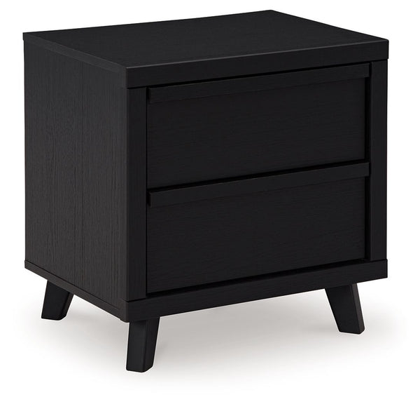 Sophisticated style for the savvy shopper. This nightstand prioritizes affordable, on-trend design. Its subtle replicated texture recalls the natural beauty of wood, highlighting the clean-lined form. And a matte black finish savvily suits different appro