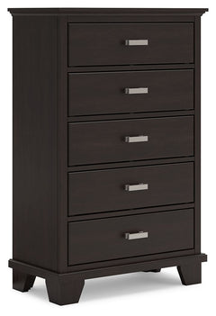 Feast your eyes on this richly versatile chest of drawers. Its traditional-inspired dark brown finish effortlessly blends with contemporary bright nickel-tone pulls to create a stunning look that-'s not too stuffy or too trendy. Spacious drawers offer ple
