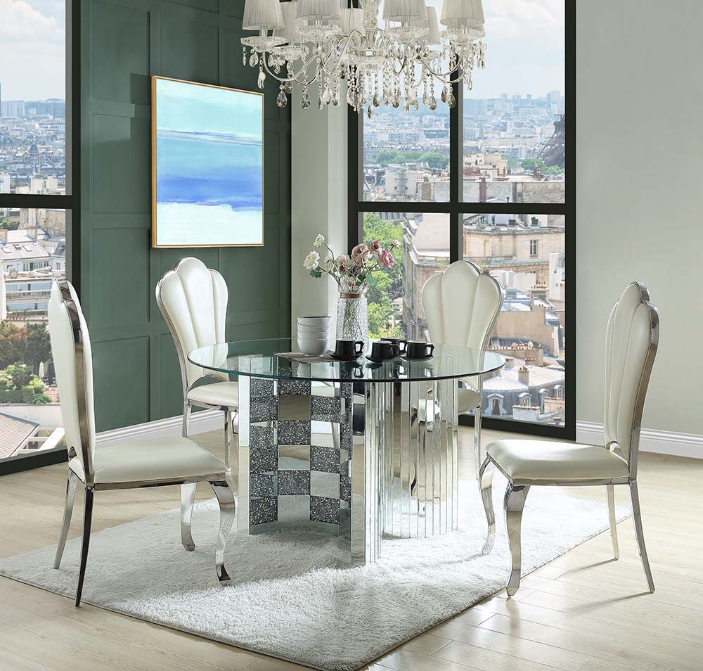 The round Ningbo dining table features an eye-catching checkboard design with faux diamonds and paneled mirrors for a contemporary glam appeal. The sturdy half-circle base securely holds a clear tempered glass tabletop, allowing the base to be the star of