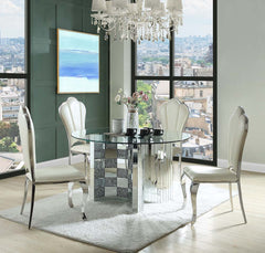 The round Ningbo dining table features an eye-catching checkboard design with faux diamonds and paneled mirrors for a contemporary glam appeal. The sturdy half-circle base securely holds a clear tempered glass tabletop, allowing the base to be the star of