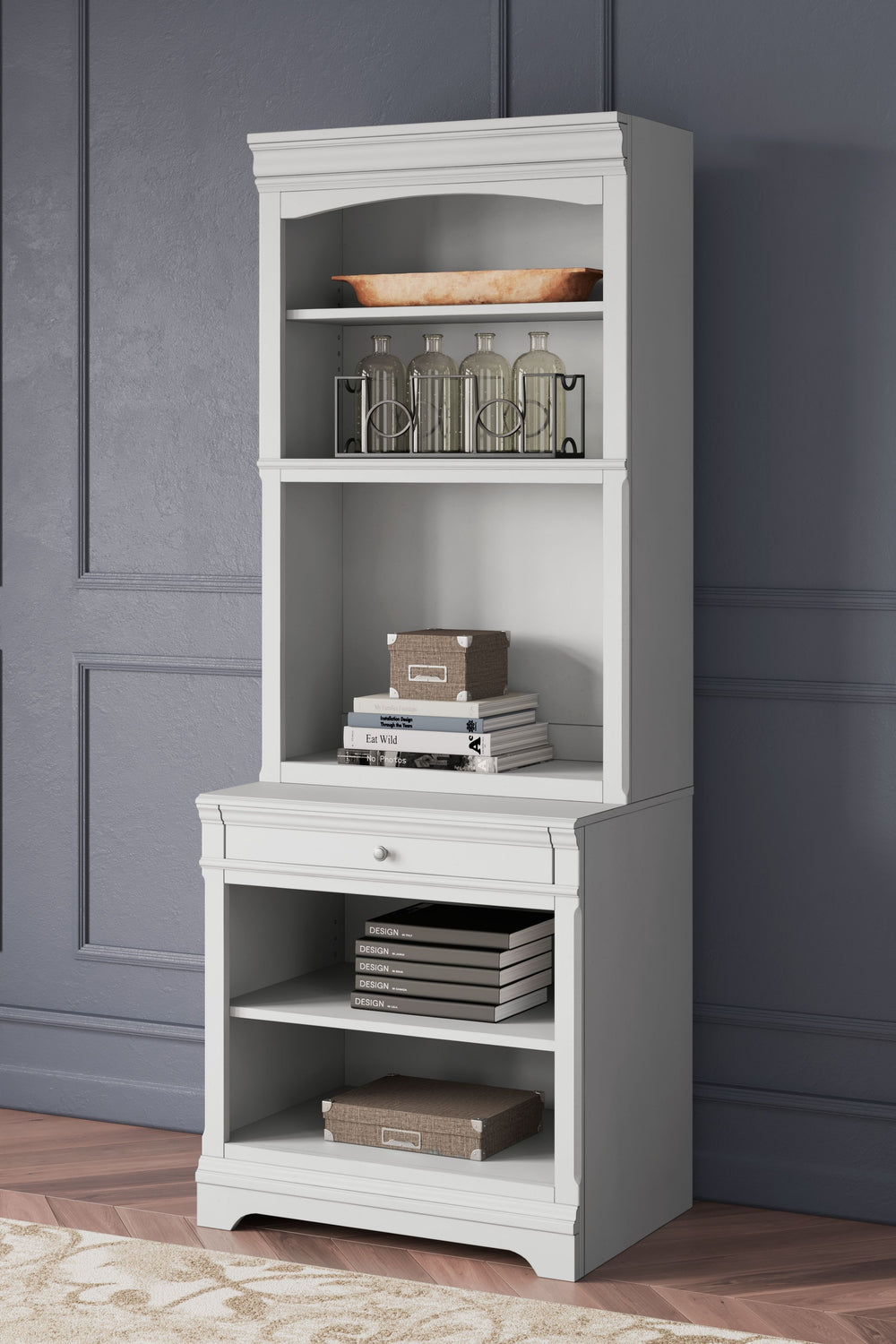 Make a style statement with this home office bookcase. Its traditional design is updated with an on-trend distressed whitewash finish. A hutch with LED underlighting shines a light on those elusive reading glasses and other desktop items. The bookshelf, d