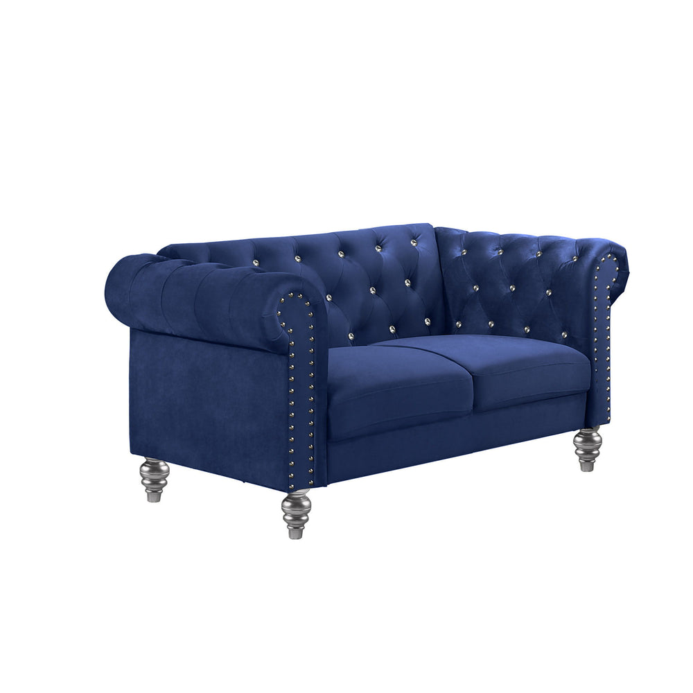 The New Classic Emma Chesterfield Velvet 2 Seat Sofa Loveseat is a blend of soft elegance and sophisticated design. Crafted from 100% polyester velvet fabric, it offers cozy and indulgent seating for two. The glam tailoring features tufted backs and arms 