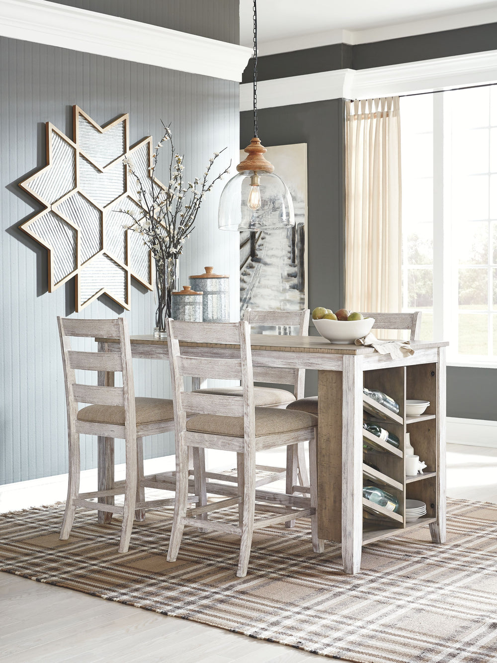 Made with Acacia veneers and select rubberwood solids, in a grayish white finish with rub through effect for a time worn appearance. Top is finished in a medium toned brown color with a planked effect with saw kerf distressing. Chair has a classic casual 