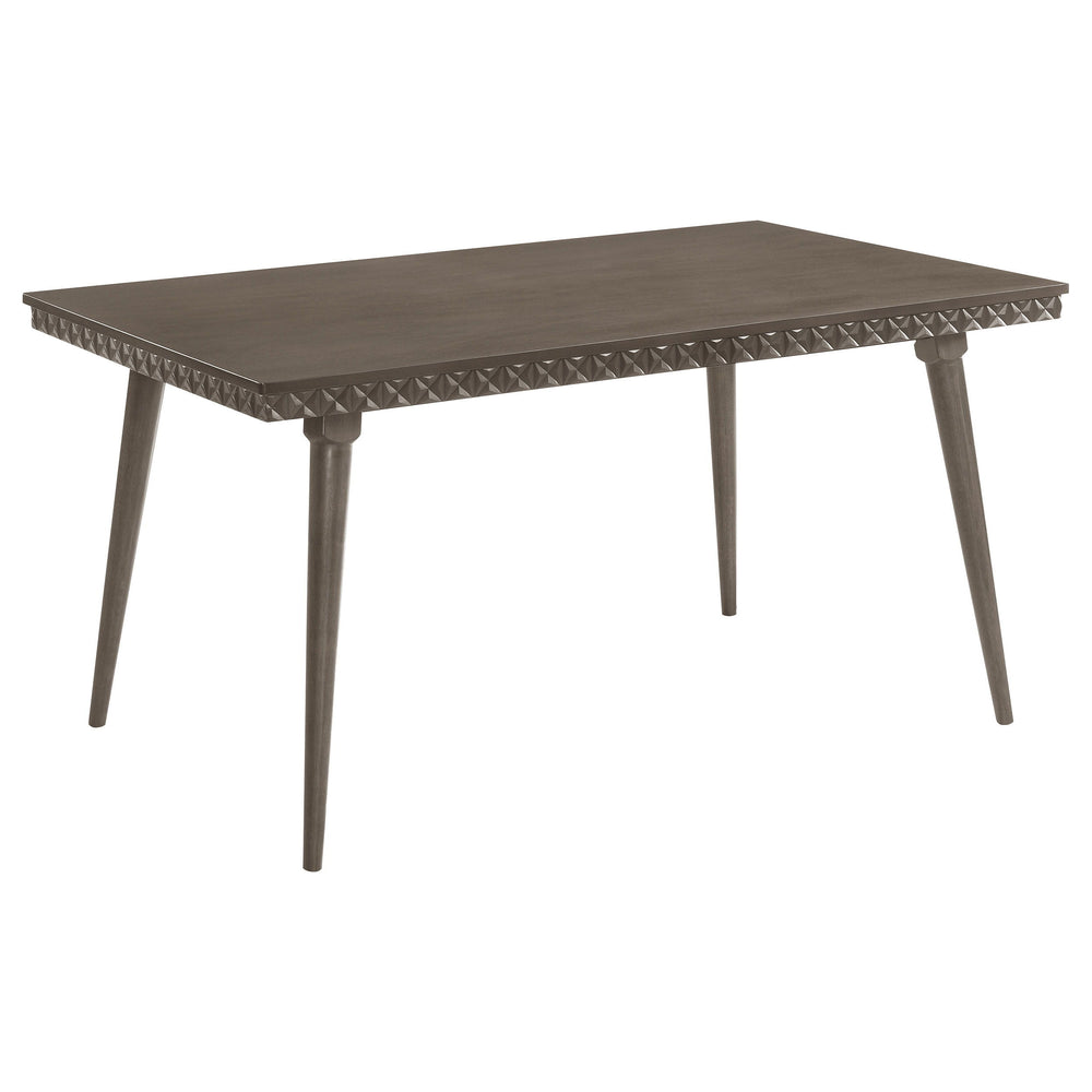 Introduce modern elegance to your dining room with this stunning 59-inch dining table. Its distinctive design features intricate detailing along the apron, adding a textural contrast to the smooth tabletop. Constructed with a blend of solid wood, engineer