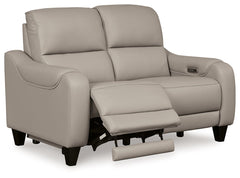 This power reclining loveseat puts a sleek twist on laid-back living. It satisfies your desire for comfort without being bulky in design, thanks to subtly incorporated one-touch reclining and adjustable headrests. With chic exposed legs and stunning stitc