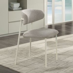 The Ingram collection brings modern elegance to your home with its sophisticated pieces. The rectangular dining table and side chairs feature a light gray finish, creating a serene dining atmosphere. The server, with its ceramic top and light gray finish,