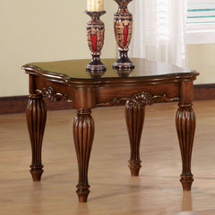 This Dreena occasional table will give your living room a stylish update. Decorative carving accents carved apron with accent details along its turned fluted legs to further intensify the traditional design and graceful sophistication.<br/><br/><b>Product