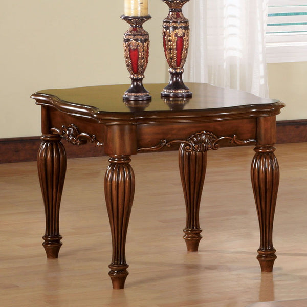 This Dreena occasional table will give your living room a stylish update. Decorative carving accents carved apron with accent details along its turned fluted legs to further intensify the traditional design and graceful sophistication.<br/><br/><b>Product