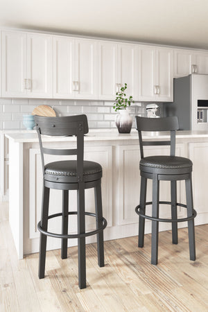  table or counter with this upholstered swivel bar stool. The sturdy wood frame with contoured backrest is beautified with an antiqued black finish thatâ€™s a welcome change from the everyday ordinary. For your co