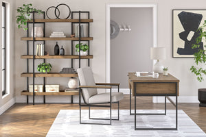Urban Contemporary design. Made with Mango wood veneer, MDF substrate and metal frames. Finished in a light brown wood tone with contrasting gunmetal gray frames. Desk features 3 drawers and open raceway on the back side to help keep wires and power suppl