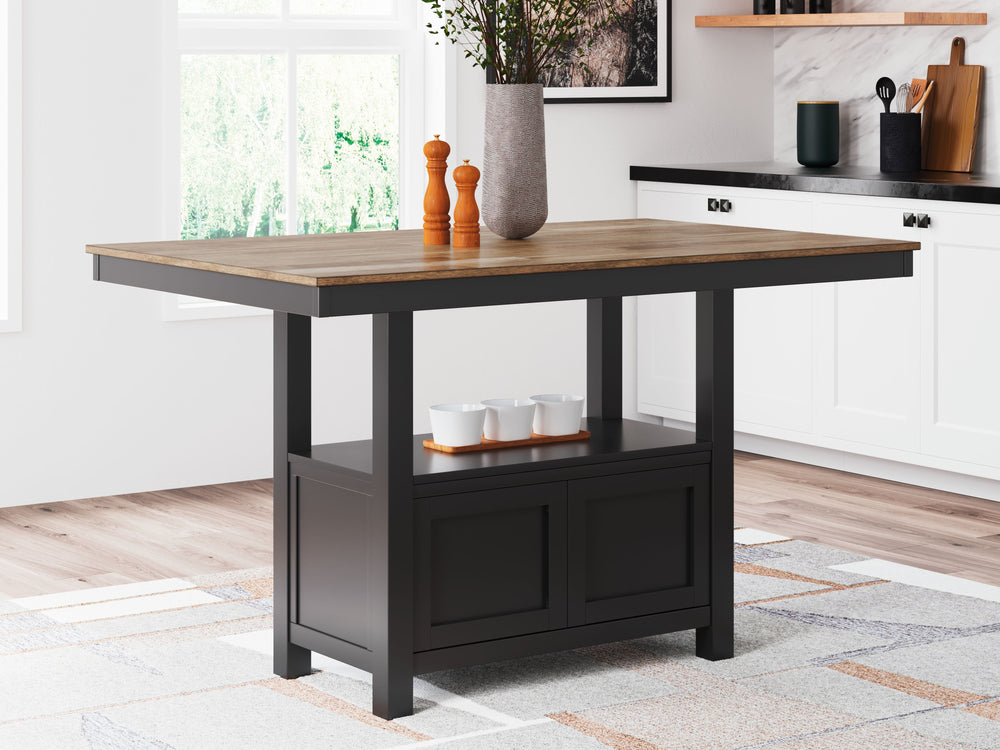 This counter height dining table dresses up your favorite farmhouse motifs with modern flair. A butcherblock-style top provides ruggedly chic contrast to the sleek black base. Short on storage space? The pedestalâ€™s built-in cabinet, with doors on each s