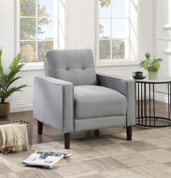  this chair boasts a perfect small-scale design. Its classic track arm and self-welt detailing highlight the superior tailoring. The grid-tufted boxed back cushions and pocket coil spring cushion construction ens