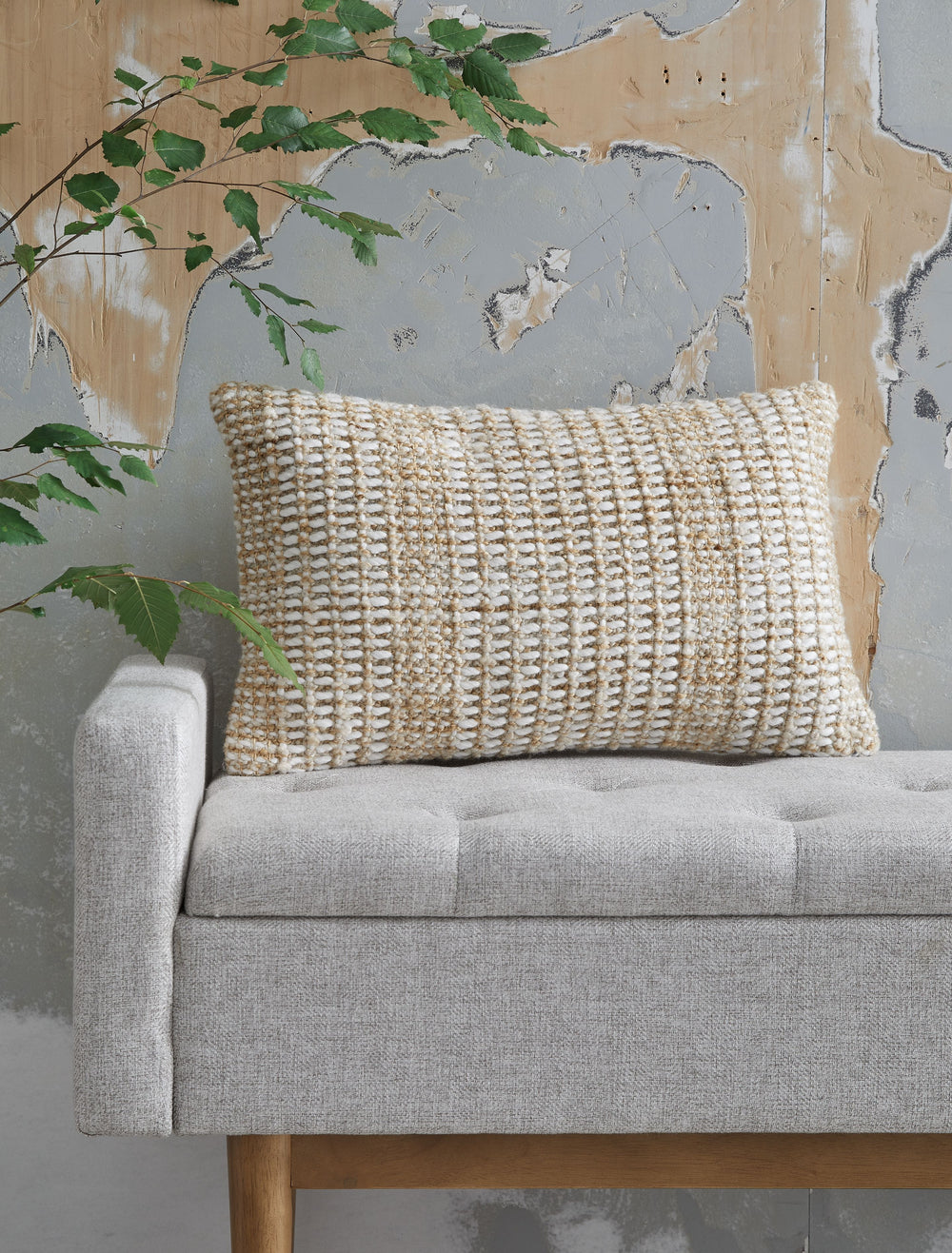 Casually cool style is well in hand with this handwoven throw pillow. Ready to impress with easygoing neutral hues in a stripe design, its soothing tones and subtle texture come together for beautiful results in your restful retreat.<br/><br/><b>Product F