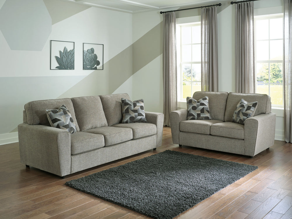 Revamp your sleekly styled living room sanctuary with this sofa and loveseat. Well-suited to contemporary spaces with a calming neutral upholstery in a pewter hue, it makes a subtle design statement in your space whether youâ€™re hosting guests or enjoyin