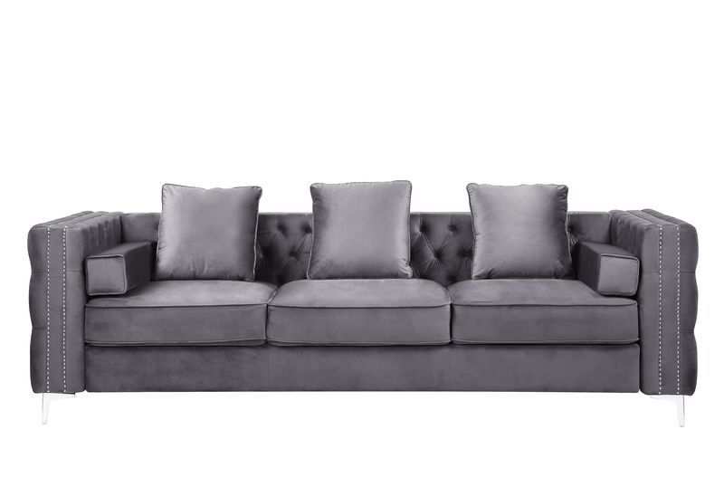 The Bovasis sofa and ottoman are ideal for smaller spaces. In a contemporary design featuring nailhead trim and sturdy metal legs. The beautiful velvet upholstery is soft to the touch and the button tufting adds dimension to the sofa. Pair it with the mat