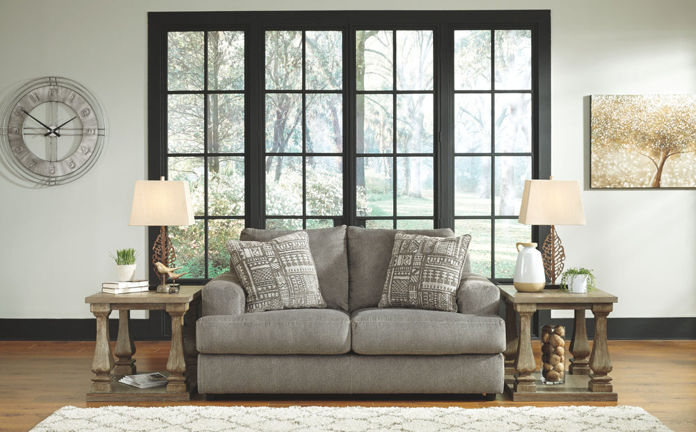 Flaunting a trendsetting silhouette, this loveseat puts the contemporary in your contemporary home. Its â€œthree over twoâ€ profile eliminates the center seat cushion, giving you elongated plushness and deep seating. And the microfiber fabric satisfies y